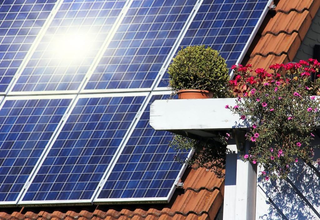 Solar panels absorbing sunlight on a roof