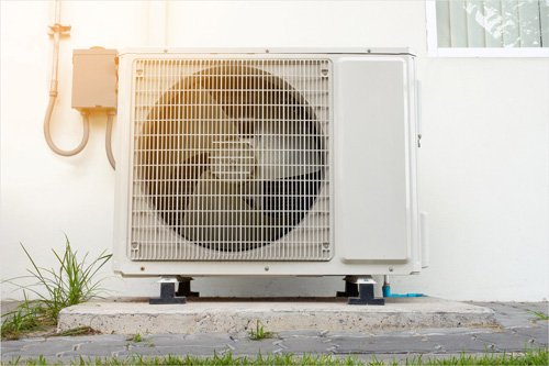 An air conditioning unit outside a white house