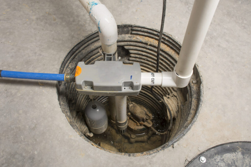 Sump pump in a basement that needs repairs